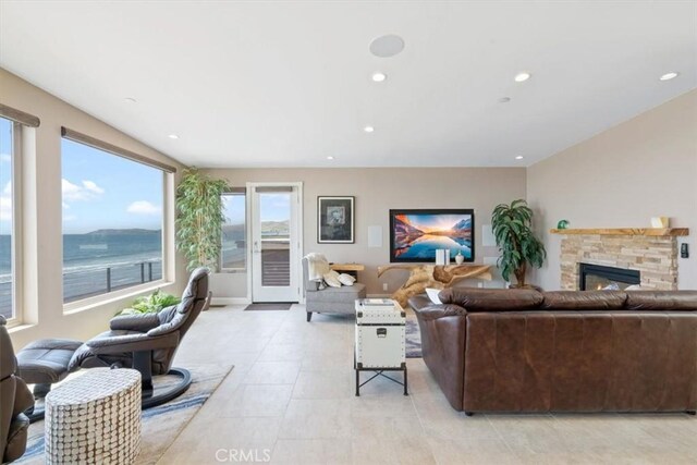 3352 Studio Dr, Cayucos, CA 93430 - living room featuring recessed lighting, a fireplace, and light tile patterned floors