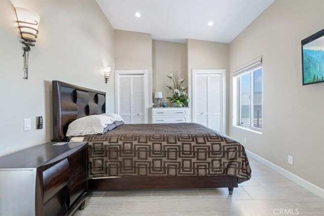 3352 Studio Dr, Cayucos, CA 93430 - bedroom with two closets, light tile patterned flooring, baseboards, and recessed lighting