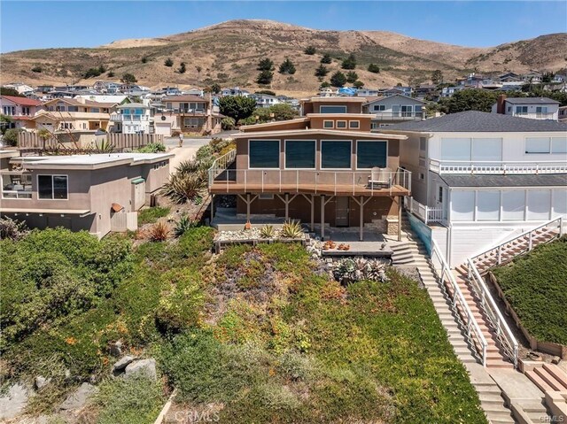 3352 Studio Dr, Cayucos, CA 93430 - back of house with stairway, a residential view, and a mountain view