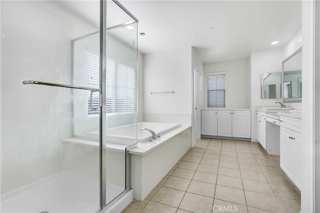 13153 Stanton Dr, Rancho Cucamonga, CA 91739 - full bathroom featuring vanity, a garden tub, a shower stall, tile patterned floors, and recessed lighting