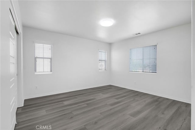 13153 Stanton Dr, Rancho Cucamonga, CA 91739 - unfurnished room with dark wood finished floors and baseboards