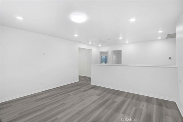 13153 Stanton Dr, Rancho Cucamonga, CA 91739 - unfurnished room with wood finished floors, recessed lighting, and baseboards