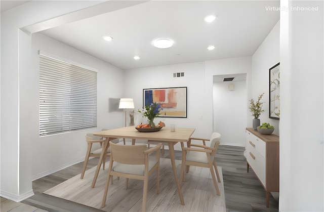 13153 Stanton Dr, Rancho Cucamonga, CA 91739 - dining area with baseboards, light wood-style flooring, and recessed lighting
