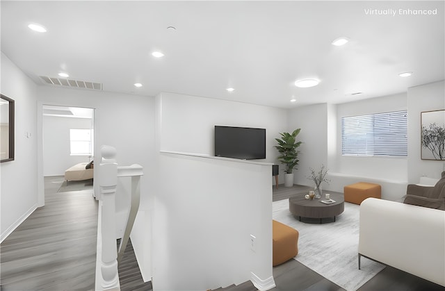 13153 Stanton Dr, Rancho Cucamonga, CA 91739 - living area featuring wood finished floors, plenty of natural light, recessed lighting, and baseboards