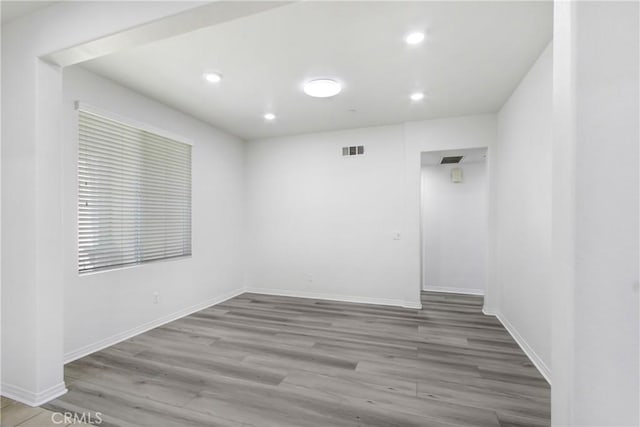 13153 Stanton Dr, Rancho Cucamonga, CA 91739 - empty room with wood finished floors, recessed lighting, and baseboards