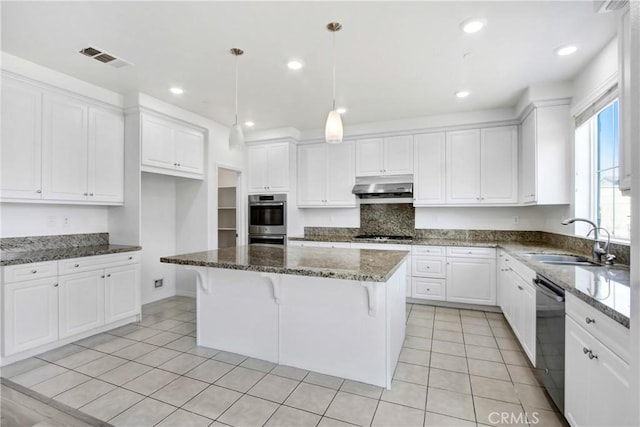 13153 Stanton Dr, Rancho Cucamonga, CA 91739 - kitchen featuring stainless steel appliances, a sink, under cabinet range hood, white cabinetry, and recessed lighting