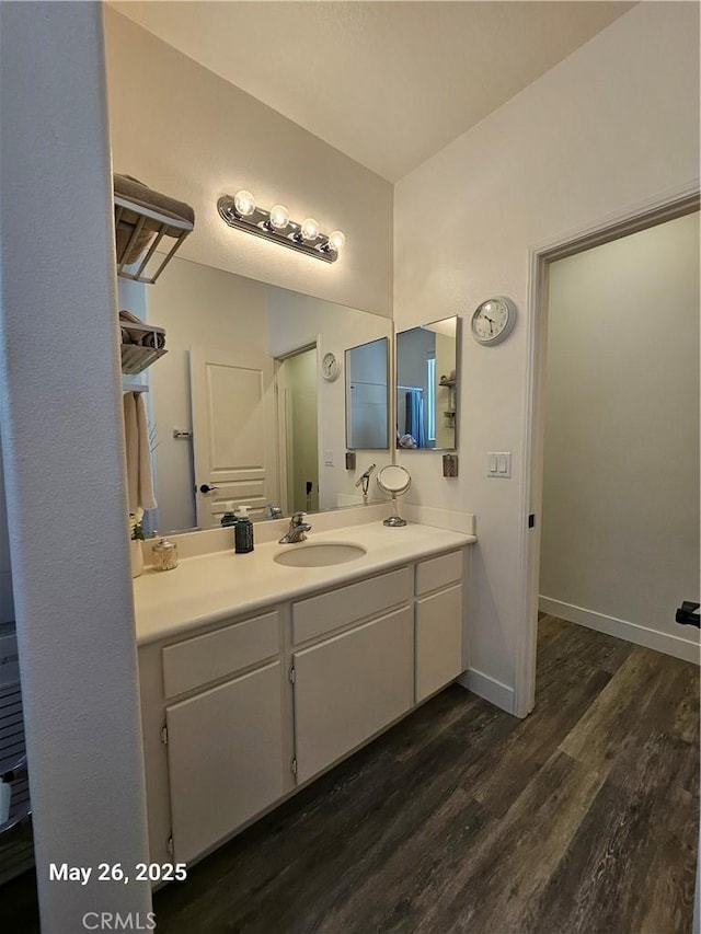 200 Janzen Way, Hemet, CA 92545 - bathroom with wood finished floors, vanity, and baseboards