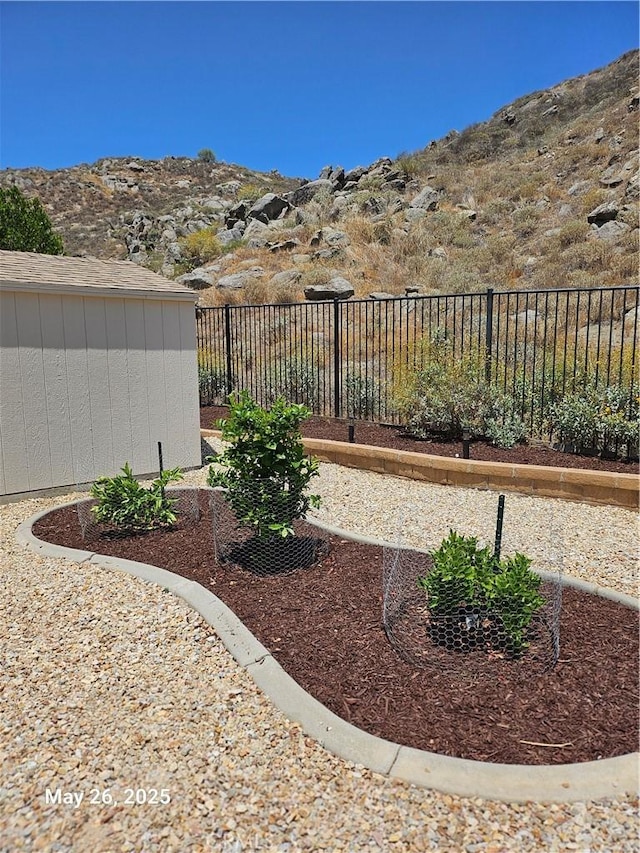 200 Janzen Way, Hemet, CA 92545 - view of yard with a storage shed and a mountain view