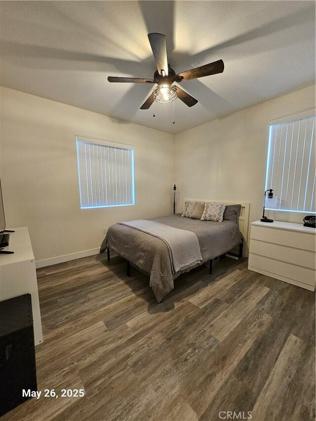 200 Janzen Way, Hemet, CA 92545 - bedroom featuring dark wood-style flooring and a ceiling fan
