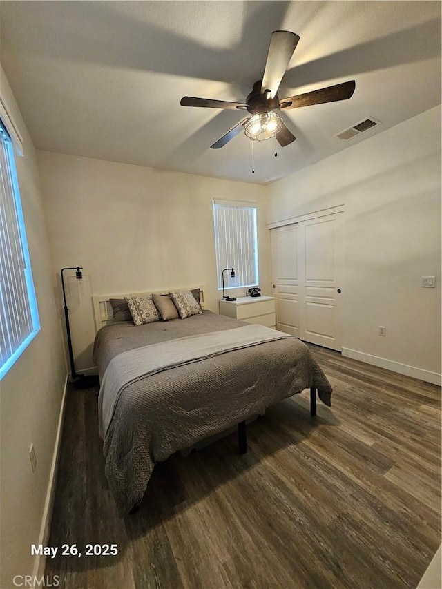 200 Janzen Way, Hemet, CA 92545 - bedroom with dark wood-style floors, baseboards, a ceiling fan, and a closet