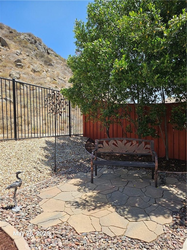 200 Janzen Way, Hemet, CA 92545 - fenced backyard with a patio and a mountain view