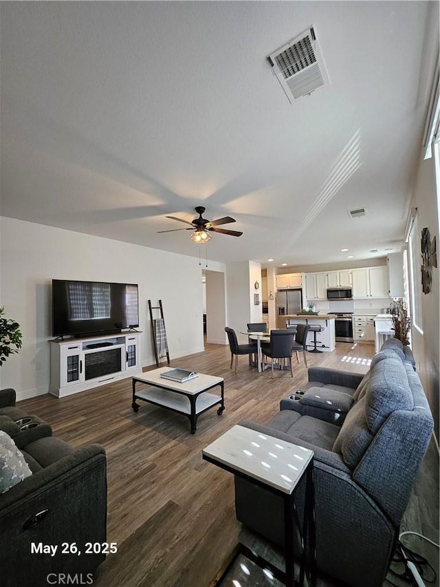 200 Janzen Way, Hemet, CA 92545 - living area featuring dark wood-style flooring and ceiling fan