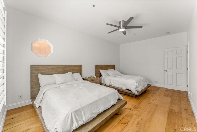 2189 Myers St, Riverside, CA 92503 - bedroom featuring light wood-style flooring, baseboards, and ceiling fan
