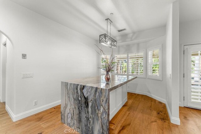 2189 Myers St, Riverside, CA 92503 - interior space featuring white cabinets, baseboards, and light wood-style floors