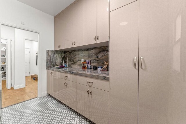 2189 Myers St, Riverside, CA 92503 - kitchen with a sink, decorative backsplash, and light floors