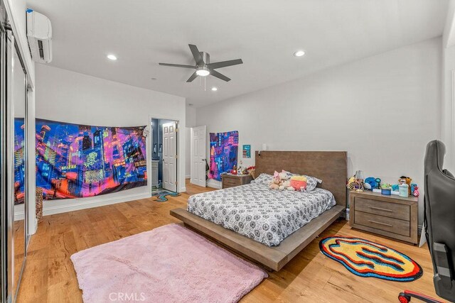 2189 Myers St, Riverside, CA 92503 - bedroom featuring a wall mounted air conditioner, wood finished floors, recessed lighting, and ceiling fan