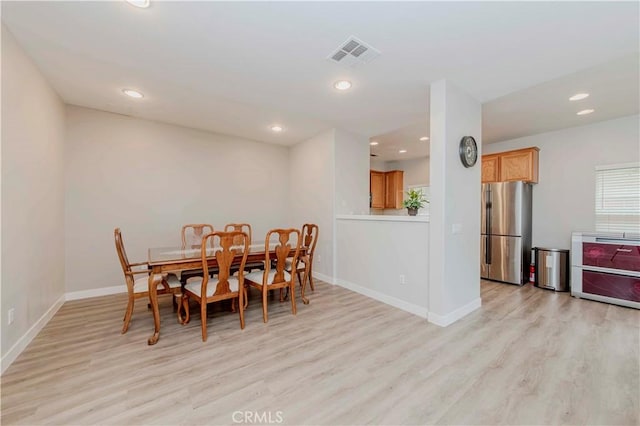 9135 W Rancho Park Cir, Rancho Cucamonga, CA 91730 - dining space with light wood finished floors, baseboards, and recessed lighting