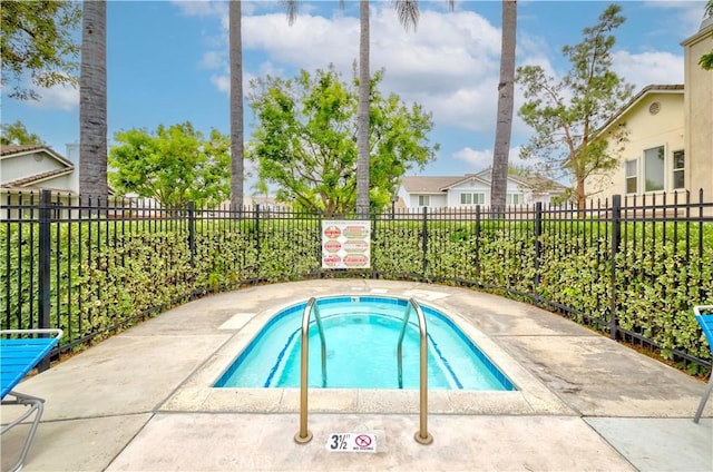 9135 W Rancho Park Cir, Rancho Cucamonga, CA 91730 - view of swimming pool featuring a community hot tub