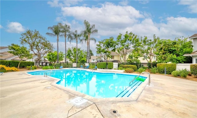 9135 W Rancho Park Cir, Rancho Cucamonga, CA 91730 - community pool with a patio