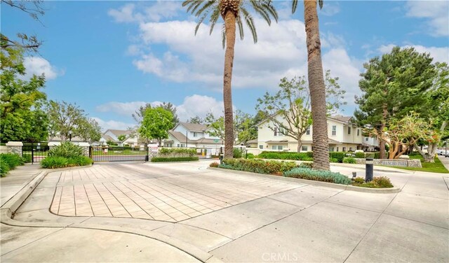 9135 W Rancho Park Cir, Rancho Cucamonga, CA 91730 - surrounding community with a residential view and a gate