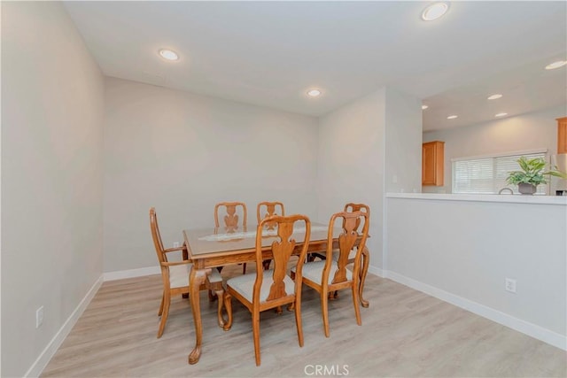 9135 W Rancho Park Cir, Rancho Cucamonga, CA 91730 - dining room with recessed lighting, light wood-type flooring, and baseboards