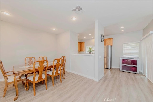 9135 W Rancho Park Cir, Rancho Cucamonga, CA 91730 - dining room with light wood-style floors, baseboards, and recessed lighting