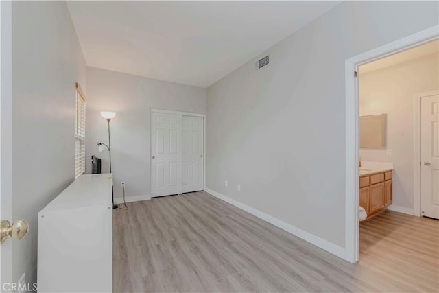 9135 W Rancho Park Cir, Rancho Cucamonga, CA 91730 - unfurnished bedroom featuring light wood-style floors, baseboards, and a closet