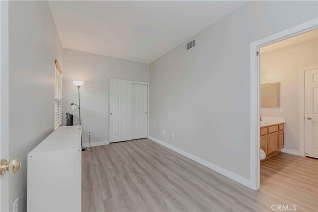 9135 W Rancho Park Cir, Rancho Cucamonga, CA 91730 - unfurnished bedroom with light wood-style floors and a closet