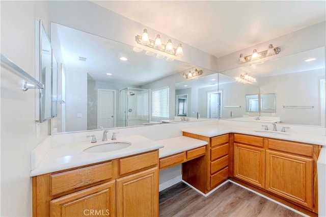 9135 W Rancho Park Cir, Rancho Cucamonga, CA 91730 - bathroom with vanity, a stall shower, wood finished floors, and recessed lighting