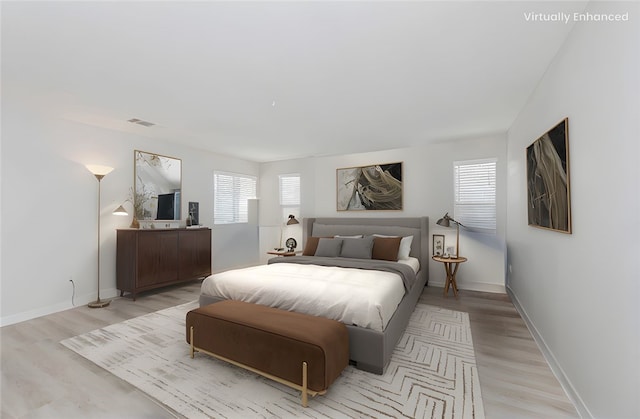 9135 W Rancho Park Cir, Rancho Cucamonga, CA 91730 - bedroom with light wood-type flooring and baseboards
