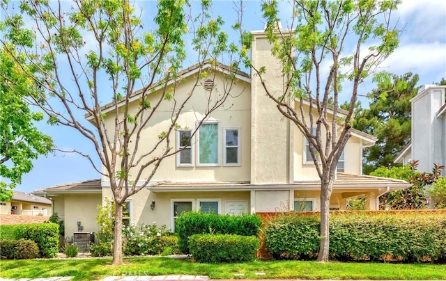 9135 W Rancho Park Cir, Rancho Cucamonga, CA 91730 - view of front of house with a chimney and stucco siding