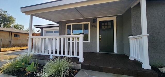 5818 Tyler St, Riverside, CA 92503 - doorway to property with stucco siding and covered porch