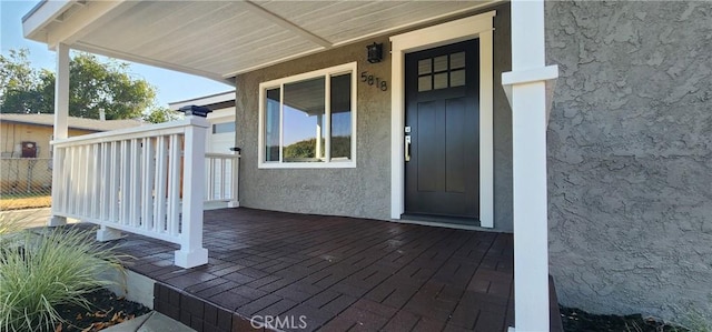 5818 Tyler St, Riverside, CA 92503 - property entrance featuring stucco siding and a porch