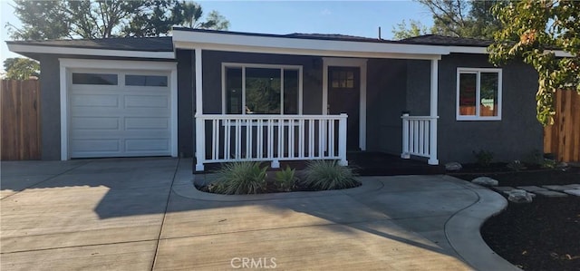 5818 Tyler St, Riverside, CA 92503 - single story home with covered porch, stucco siding, an attached garage, and concrete driveway