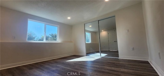 5818 Tyler St, Riverside, CA 92503 - unfurnished bedroom featuring dark wood finished floors, baseboards, recessed lighting, and a closet