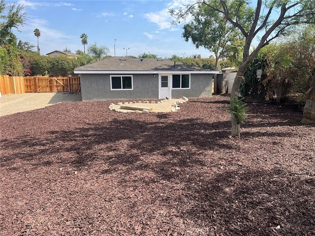 5818 Tyler St, Riverside, CA 92503 - rear view of house featuring stucco siding