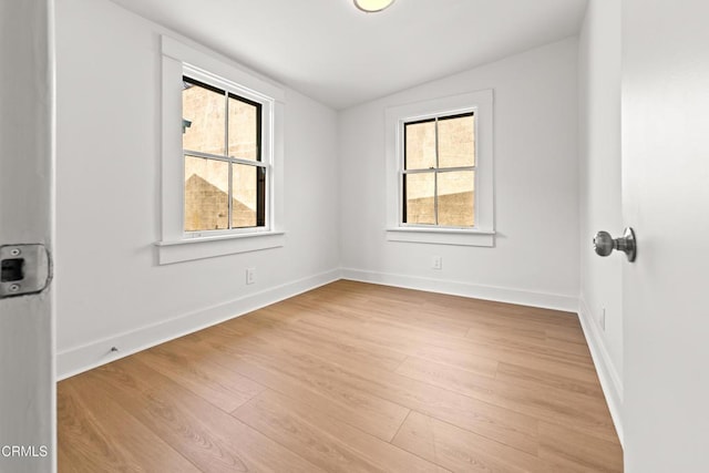 5333 Monte Vista St, Highland Park, CA 90042 - unfurnished room featuring light wood finished floors, vaulted ceiling, and baseboards
