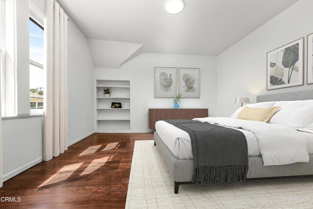 5333 Monte Vista St, Highland Park, CA 90042 - bedroom featuring wood finished floors, baseboards, and lofted ceiling