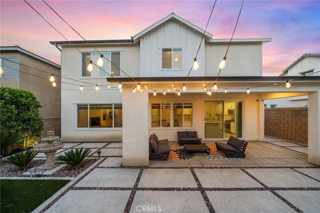 4745 S Mae Way, Ontario, CA 91762 - rear view of property with a patio area, board and batten siding, stucco siding, and an outdoor hangout area