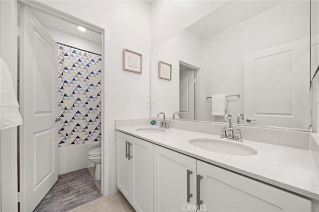 4745 S Mae Way, Ontario, CA 91762 - bathroom with toilet, double vanity, shower / bathtub combination with curtain, and tile patterned floors