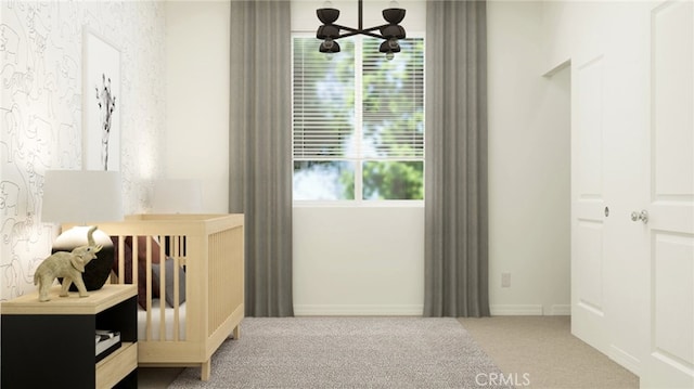 7651 Taylor Ave, Hesperia, CA 92345 - carpeted bedroom with a chandelier and baseboards