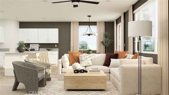 7651 Taylor Ave, Hesperia, CA 92345 - living area with ceiling fan and a chandelier