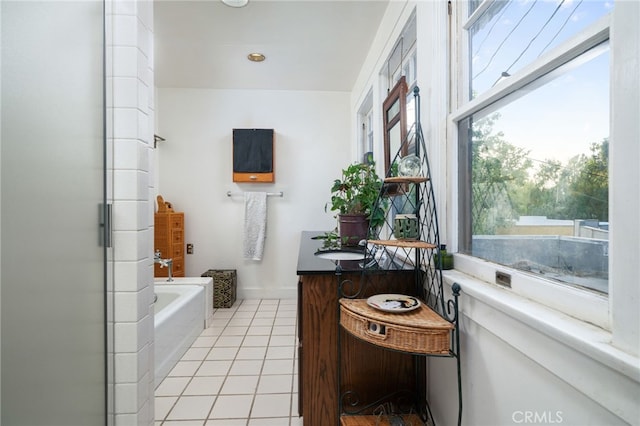 125 W 11th St, Claremont, CA 91711 - full bath featuring healthy amount of natural light, tile patterned floors, a garden tub, and vanity
