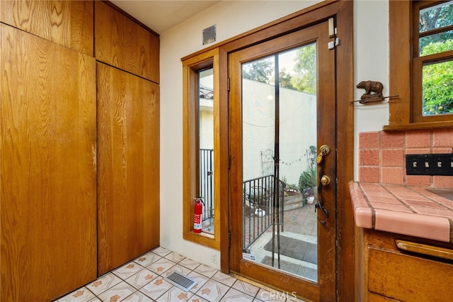 125 W 11th St, Claremont, CA 91711 - doorway featuring light tile patterned floors