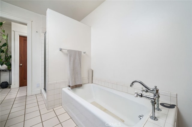 125 W 11th St, Claremont, CA 91711 - bathroom with a bath, tile patterned floors, and a stall shower