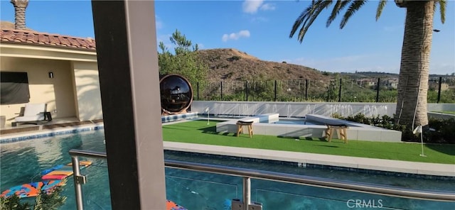 116 Clear Fls, Irvine, CA 92602 - view of swimming pool with a putting area and a mountain view