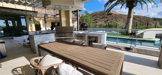 116 Clear Fls, Irvine, CA 92602 - view of patio with a mountain view and outdoor dining space