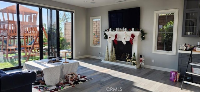 116 Clear Fls, Irvine, CA 92602 - interior space with wood finished floors, baseboards, and a fireplace