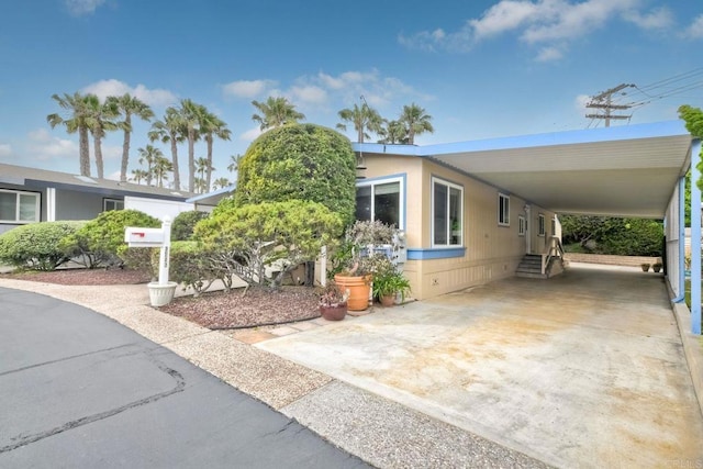 6496 Friendly Pl, Carlsbad, CA 92011 - view of front of property featuring a carport, entry steps, and driveway