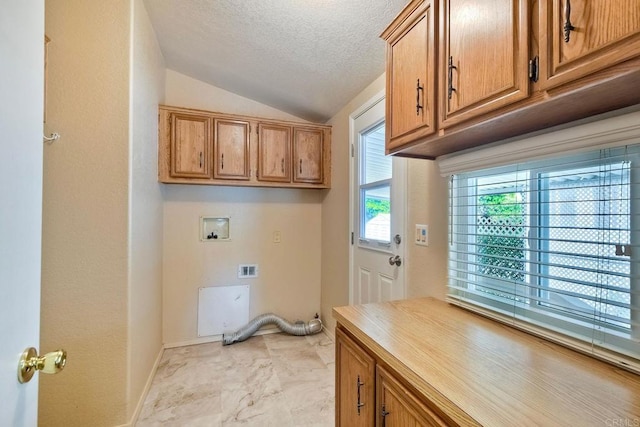 6496 Friendly Pl, Carlsbad, CA 92011 - washroom featuring cabinet space, hookup for a washing machine, baseboards, and a textured ceiling